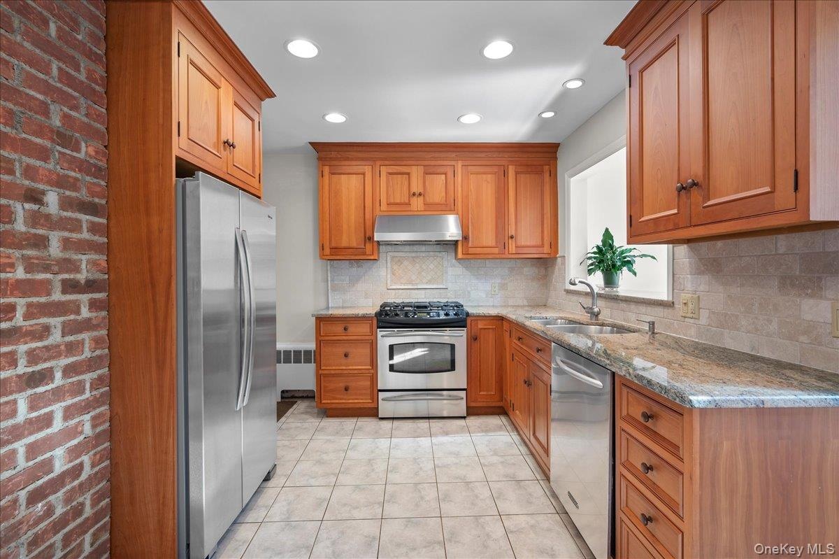 Renovated Cherrywood cabinets with granite countertops