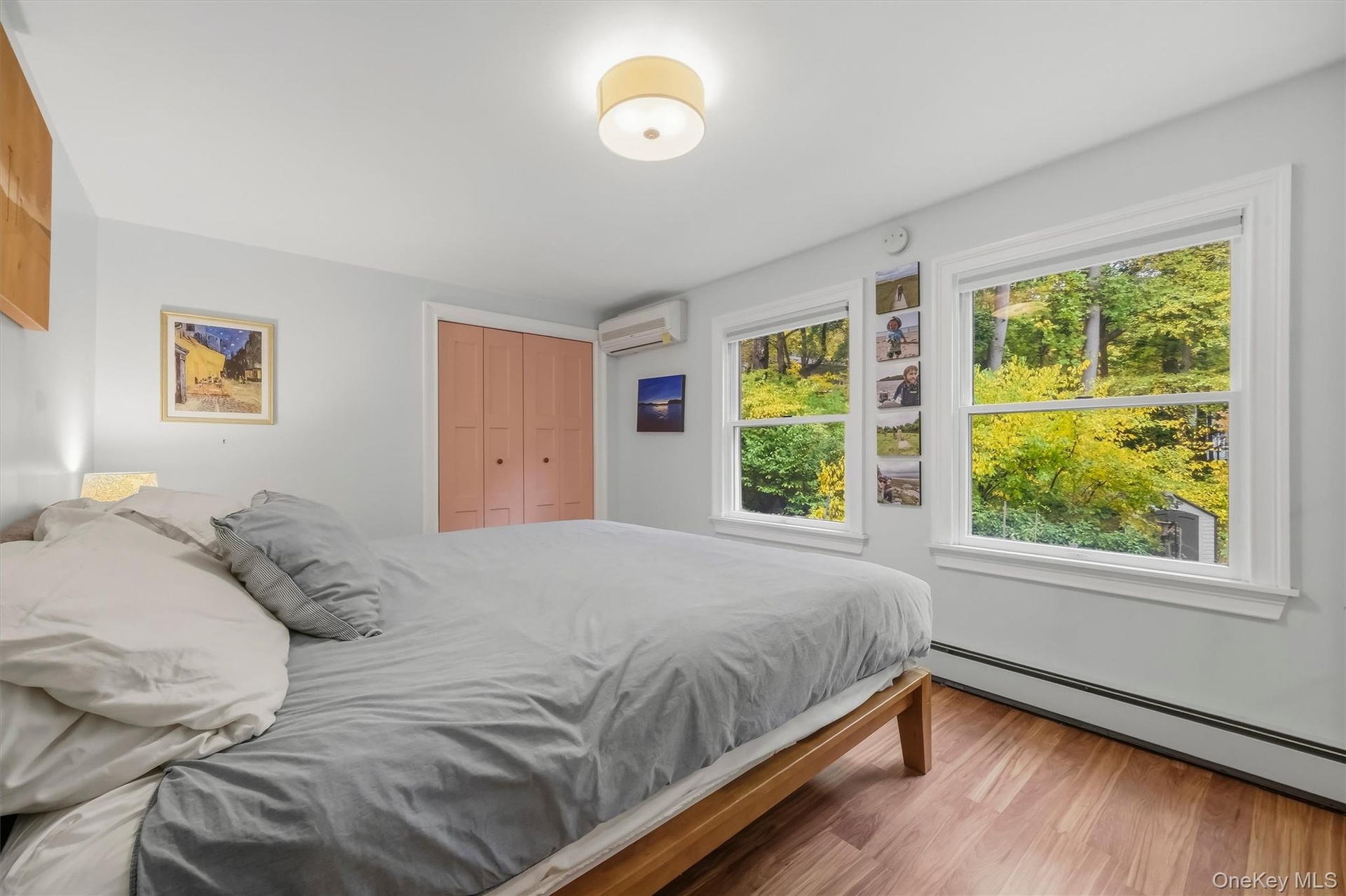 Primary bedroom with views towards the garden.