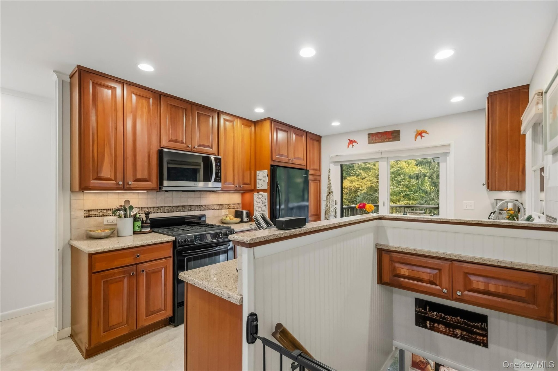 Plenty of cabinet space. Staircase leads to finish basement.