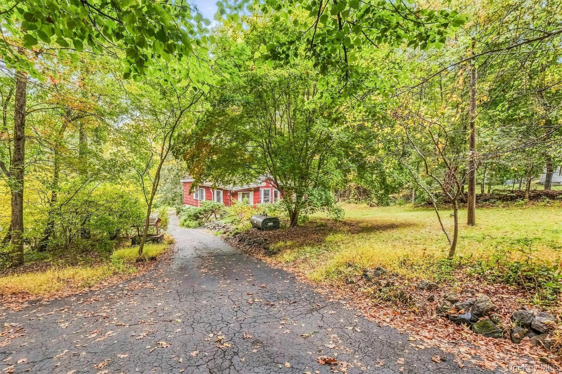 Driveway leads to property allow the front yard.