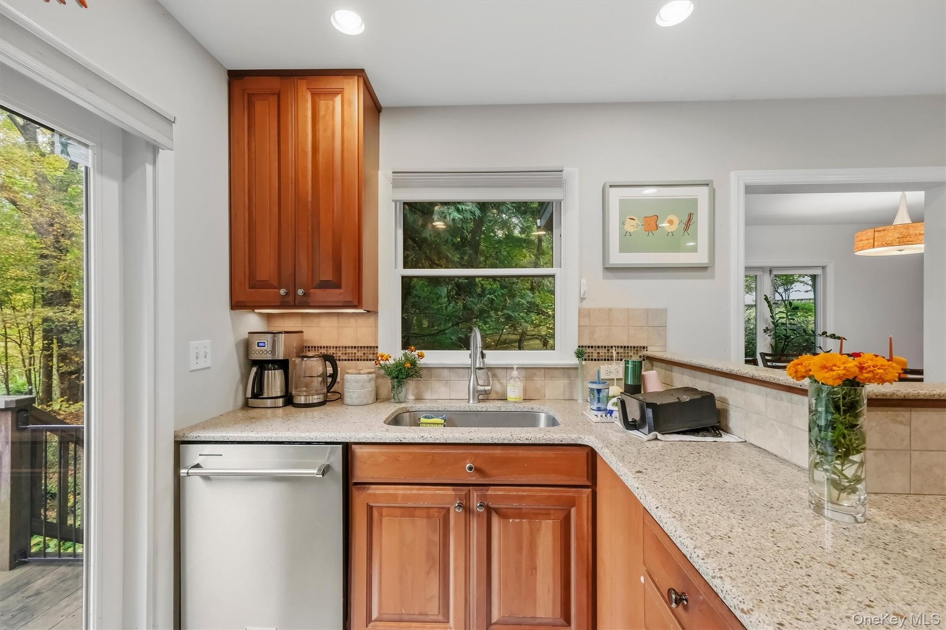 Functional kitchen space with an abundance of natural light.