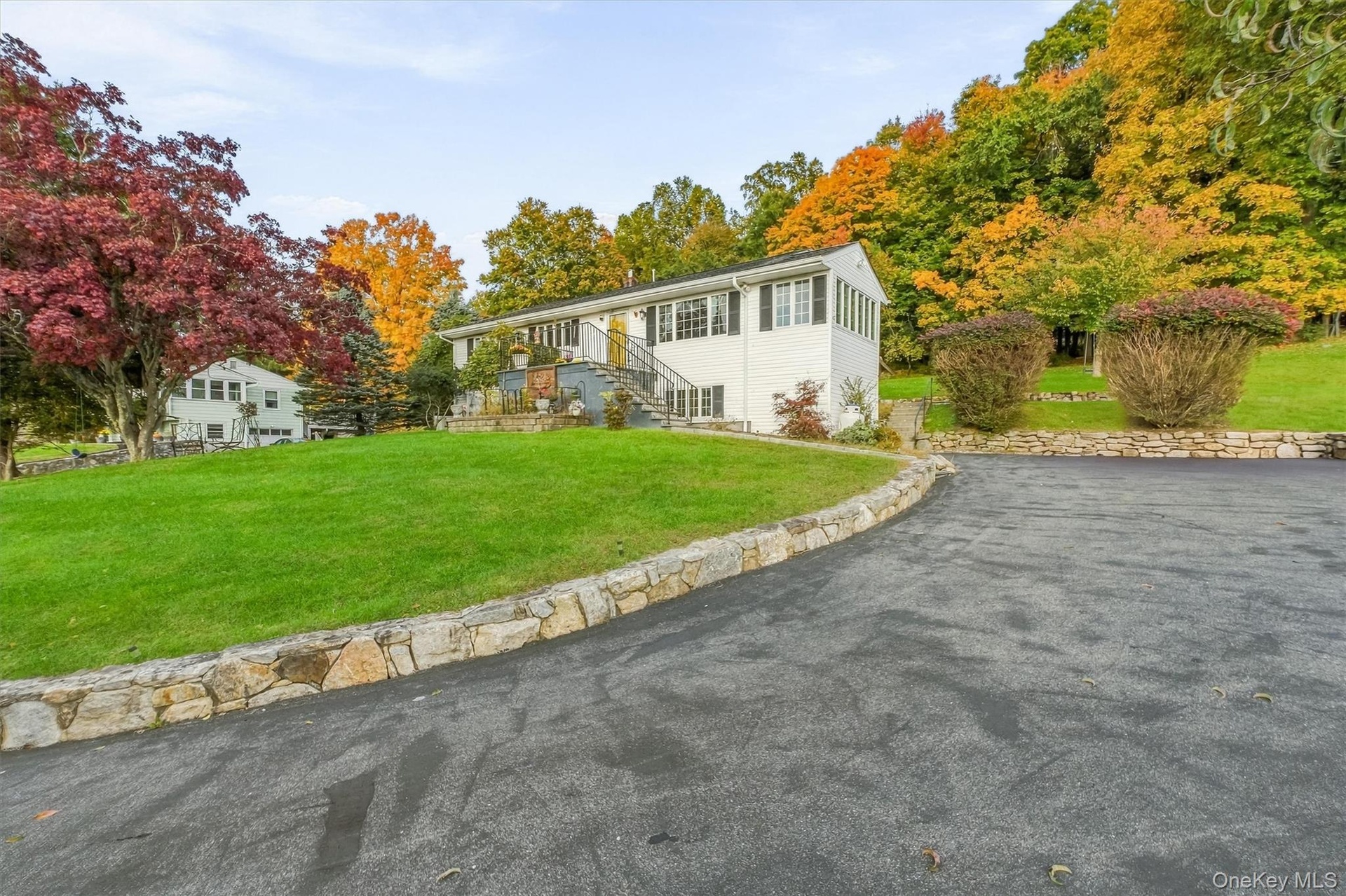 Overall nice curb appeal, many updates, stone walls, and paved walkways, landscaping.