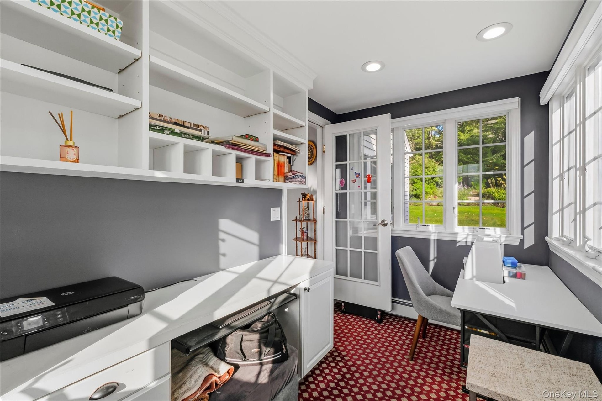 Wonderful built-ins, shelving, high hats & sunny & bright.