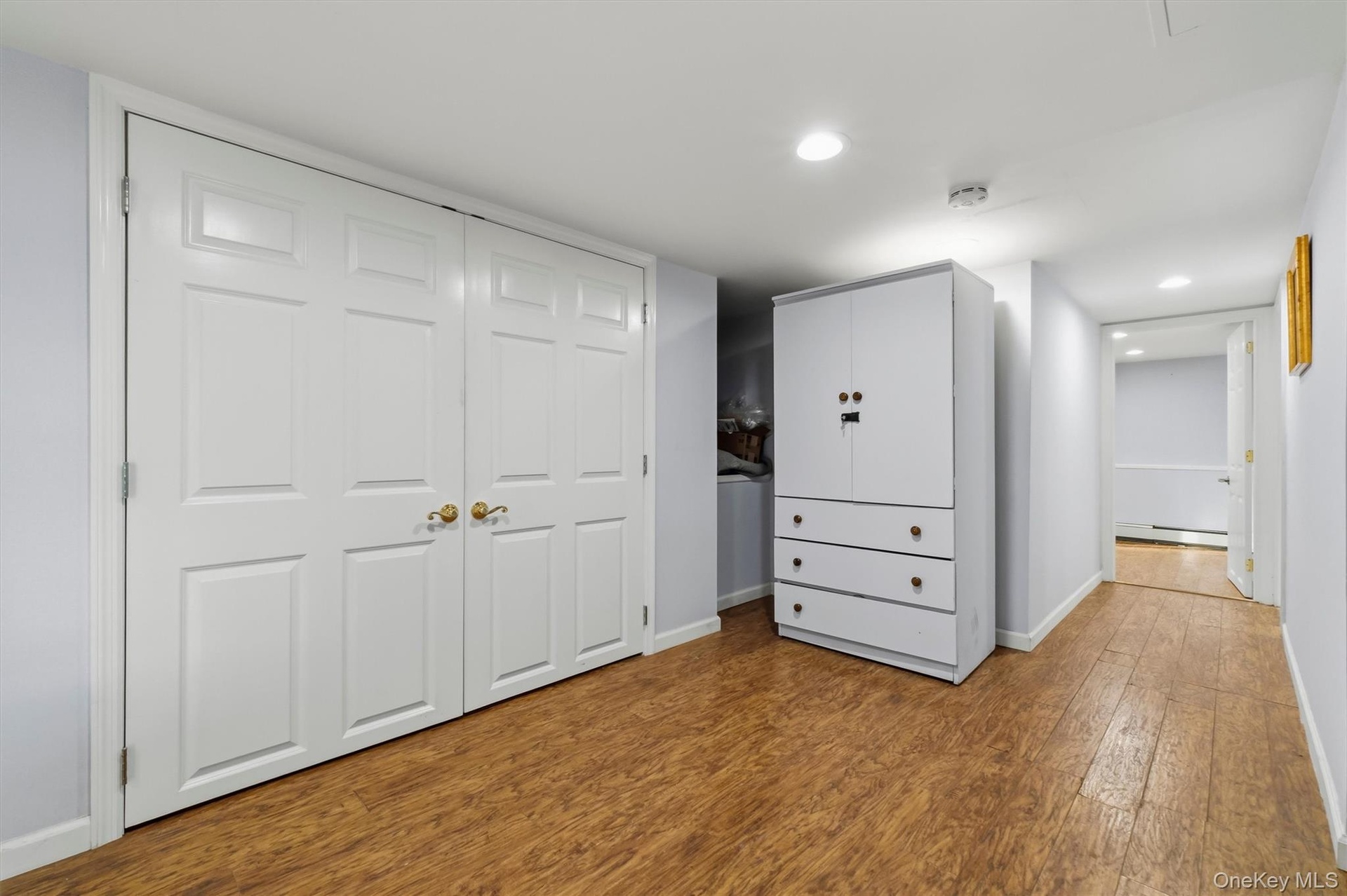 Great closet space and open hallway, recessed lighting.