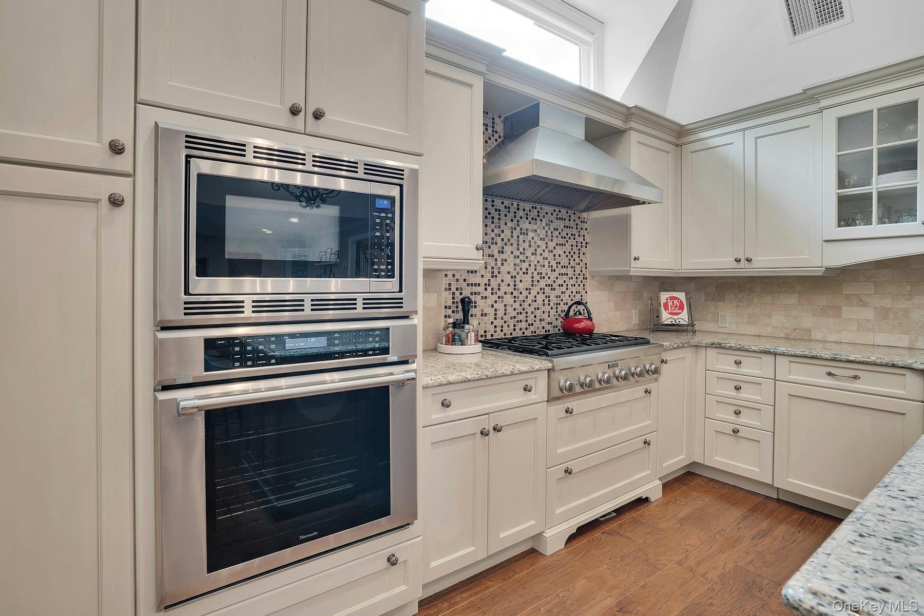 Thermador appliances and gas stove.