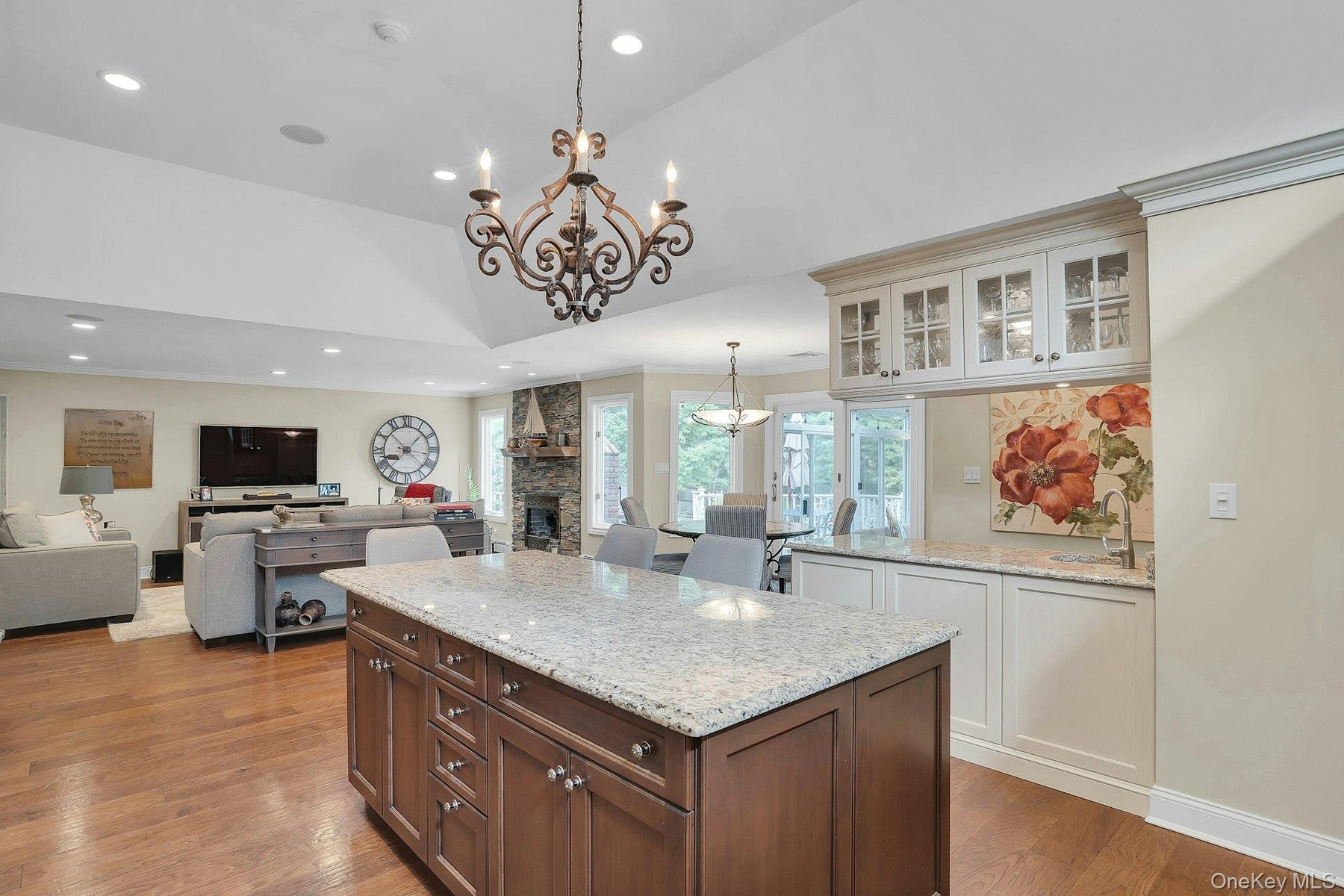 Granite counters and beautiful chandelier.