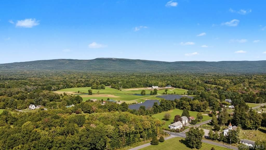 Expansive natural landscape with a prominent mountain range