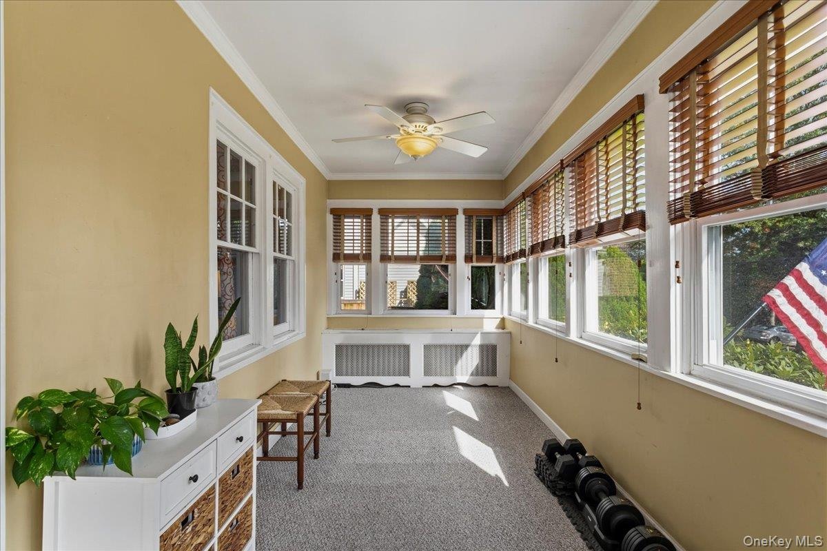 Heated sitting room with 3 sides of windows