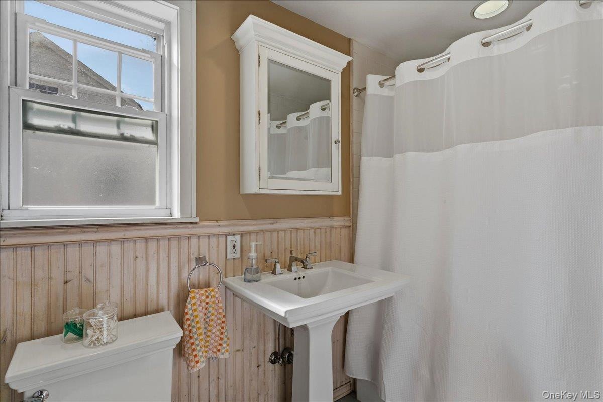 2nd floor hall bathroom, with wainscot molding