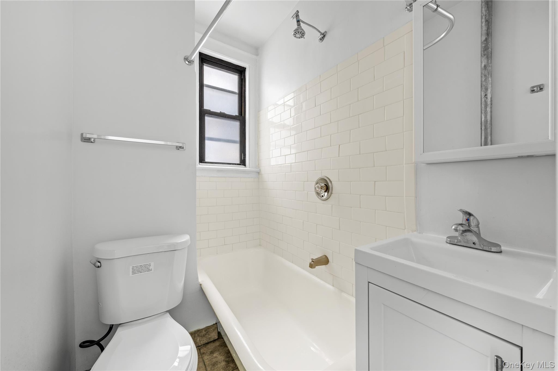 Bathroom featuring vanity and bathtub / shower combination
