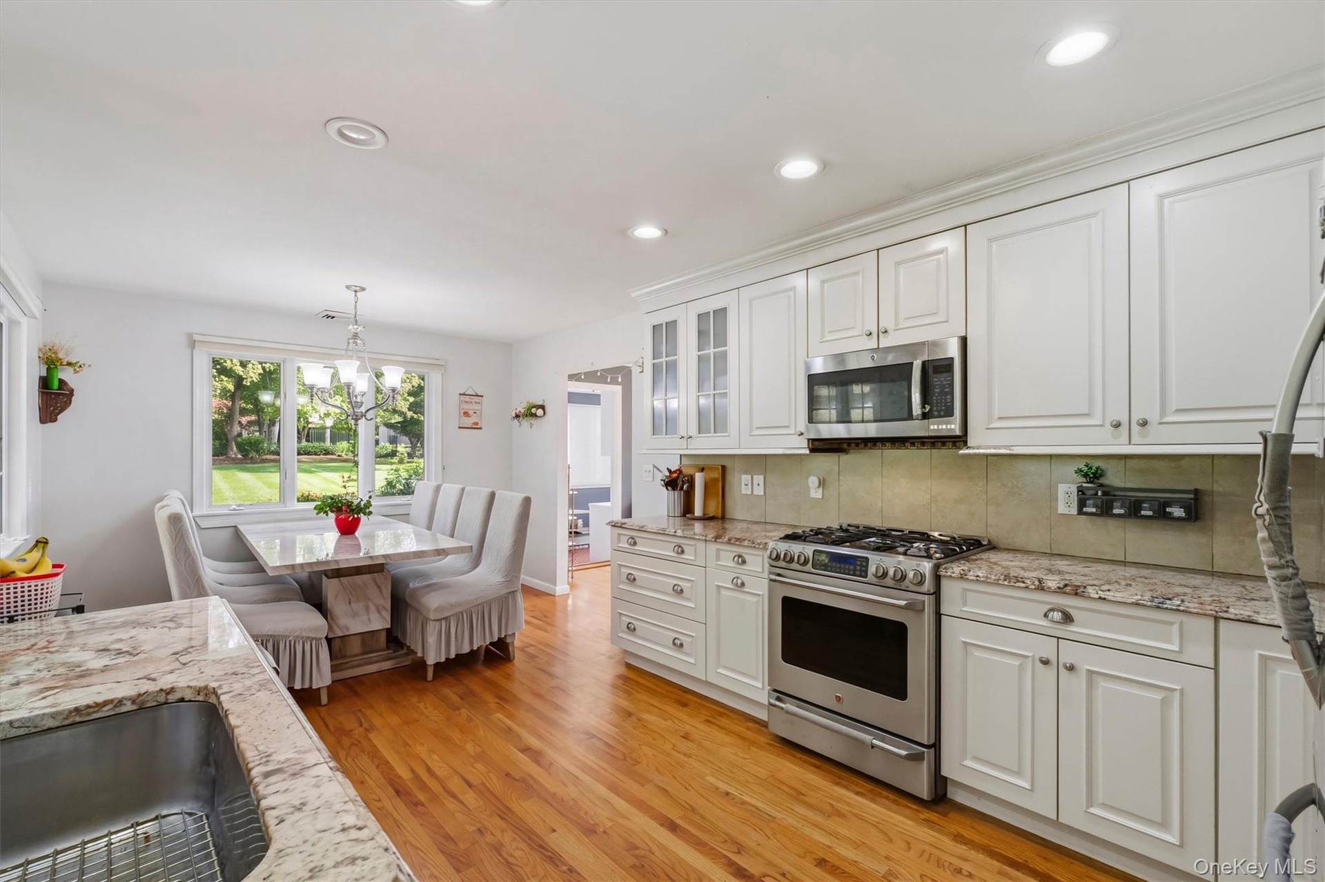 View of kitchen to large dining area.