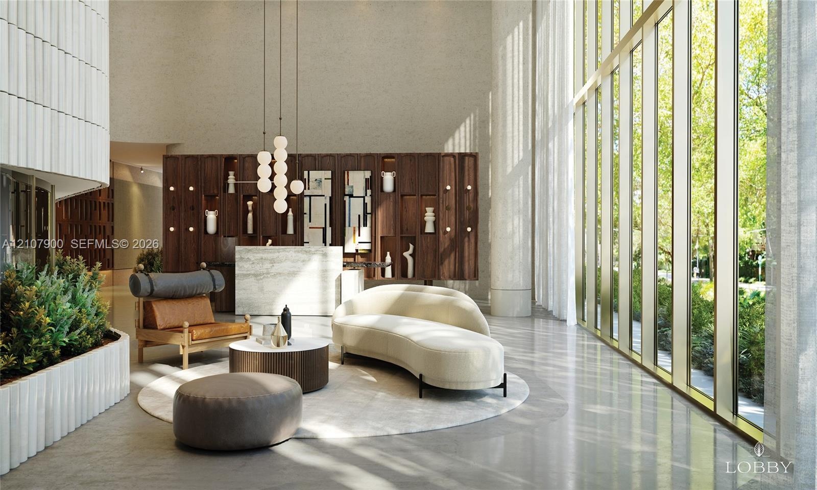 Lobby featuring floor-to-ceiling windows with metal framing, stone-finish reception desk, custom built-in wood shelving, and polished concrete floorin
