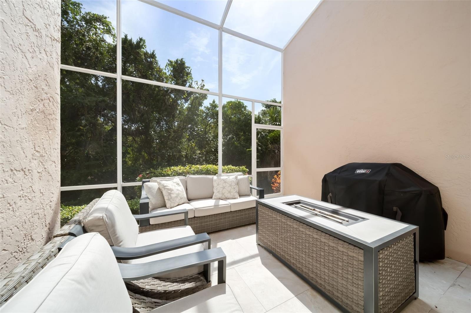 Screened in Patio with Fire Pit