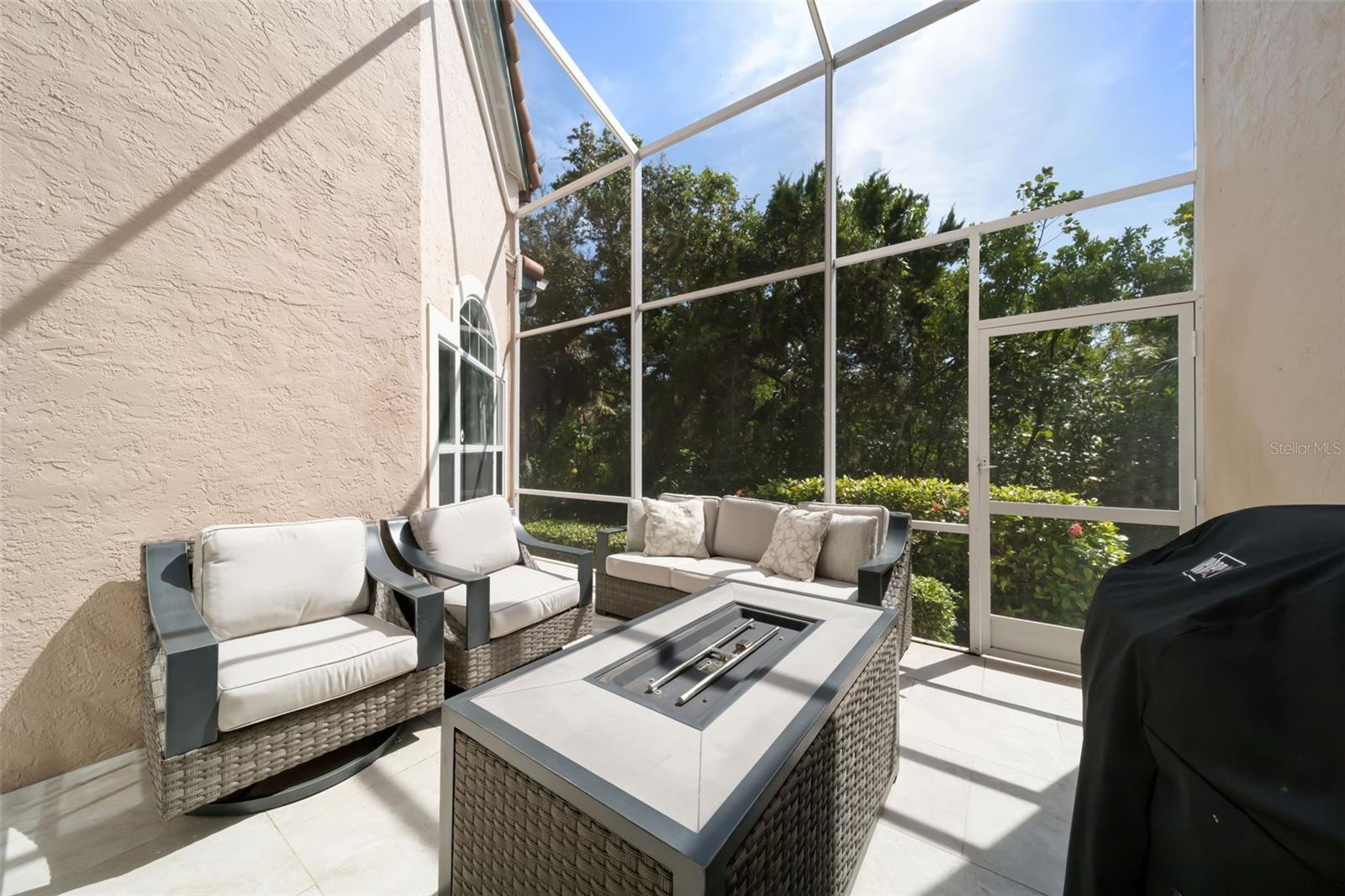 Screened in Patio with Fire Pit