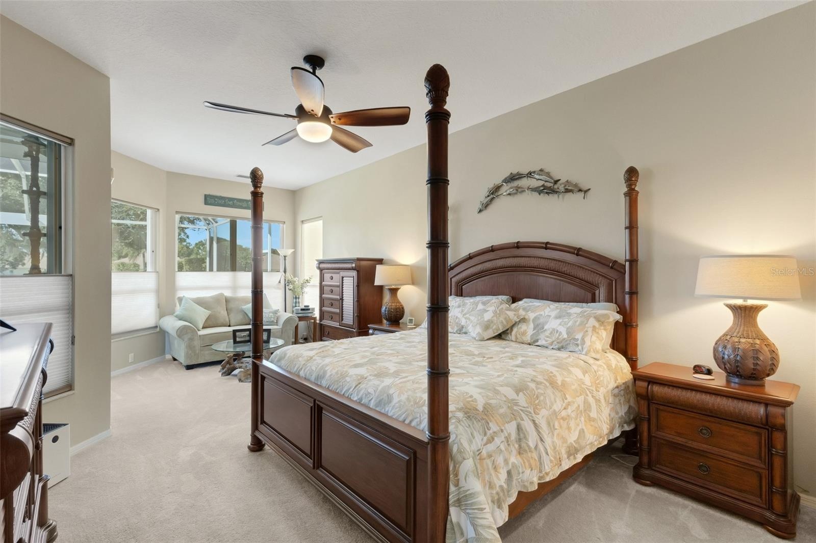 Huge primary bedroom with sitting area and views