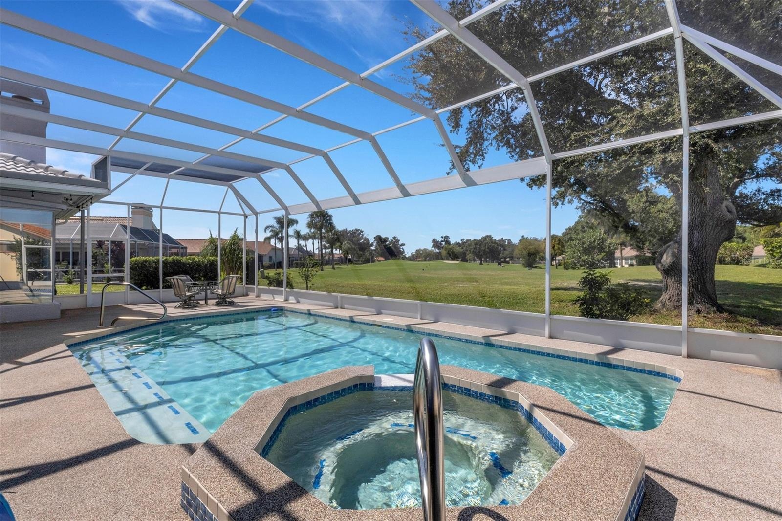 Pool and hot tub looking out to 8th Tee