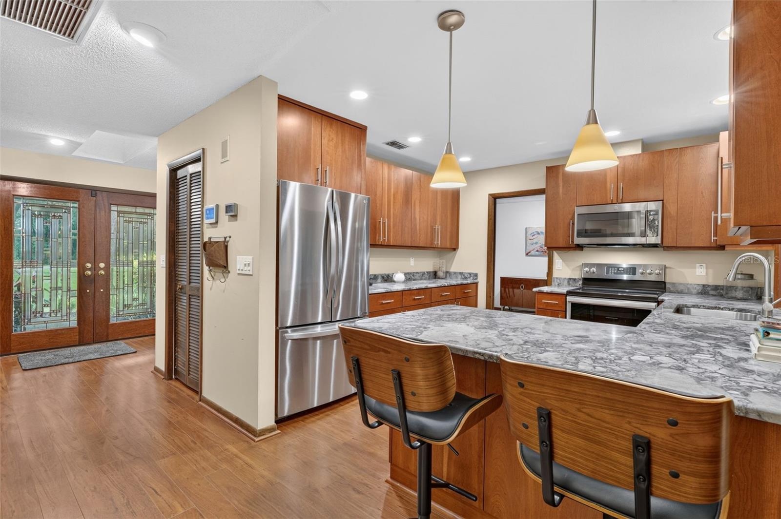 Kitchen looking to front door