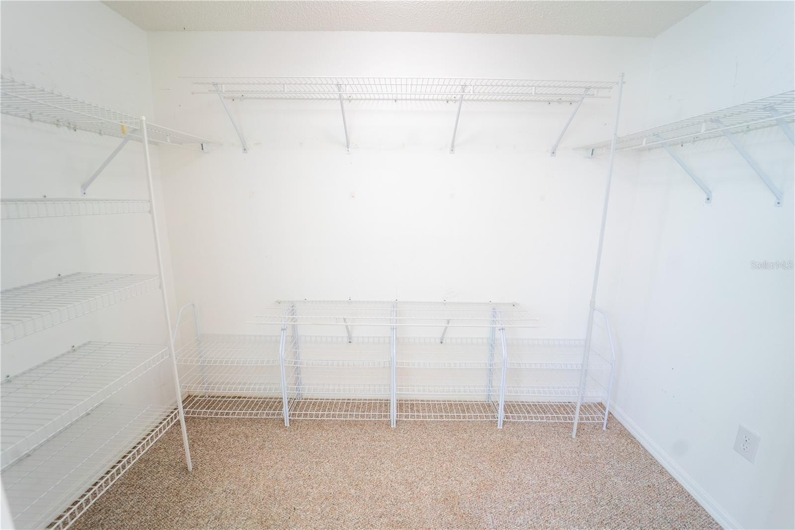 1 of 2 WALK IN CLOSETS IN PRIMARY