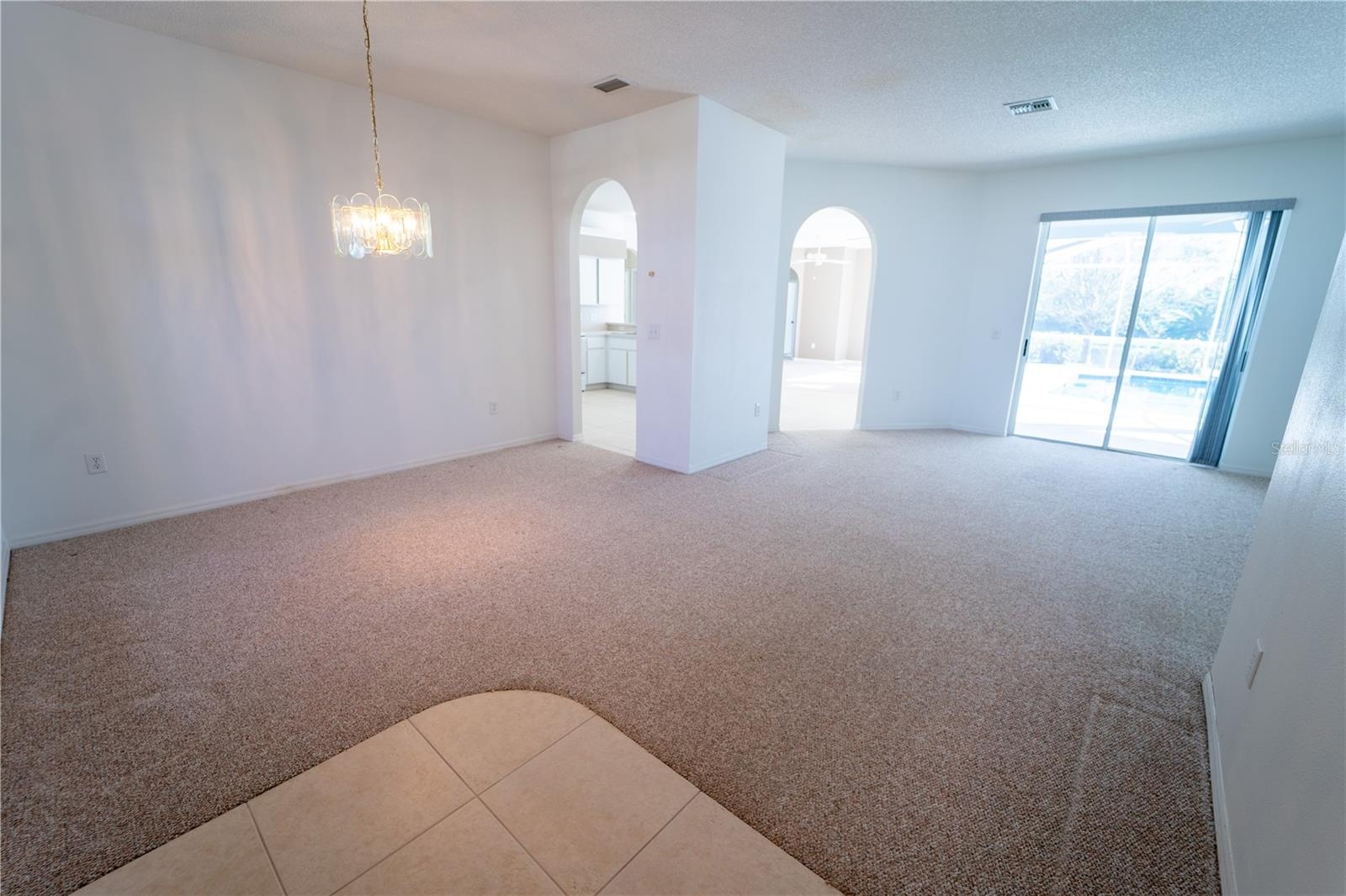 VIEW FROM FRONT DOOR.... FORMAL DINING & LIVING ROOMS