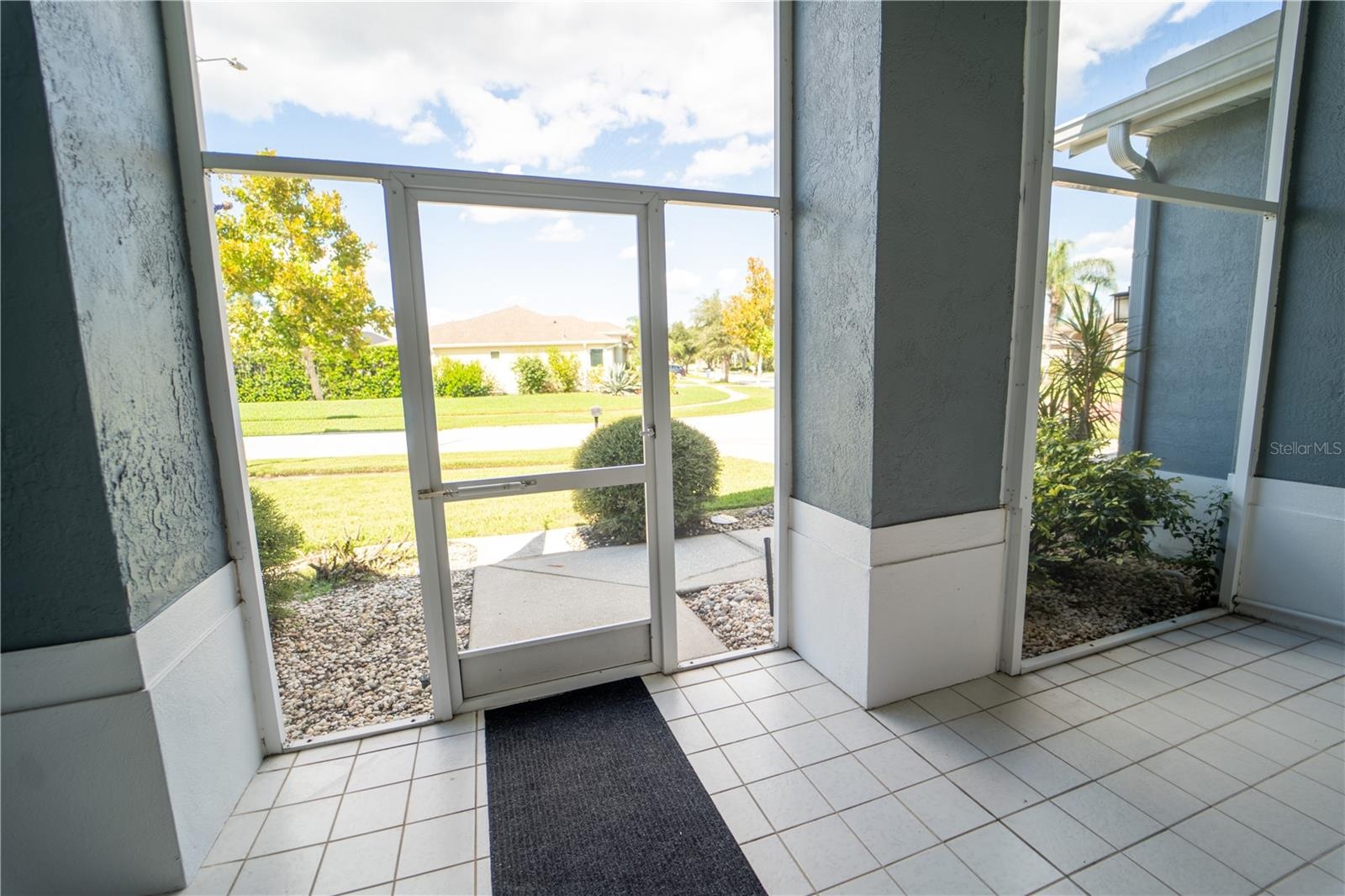 SCREENED IN FRONT PATIO