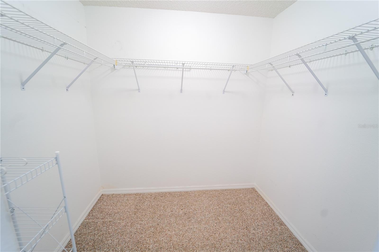 1 of 2 WALK IN CLOSETS IN PRIMARY
