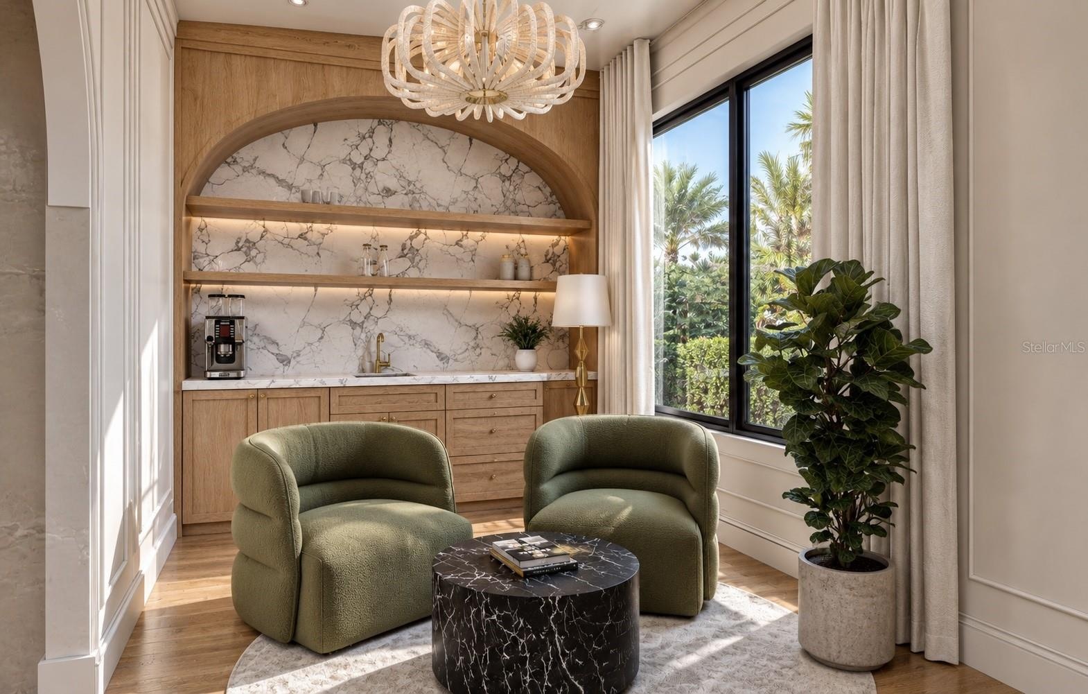Owners suite sitting room with wet-bar