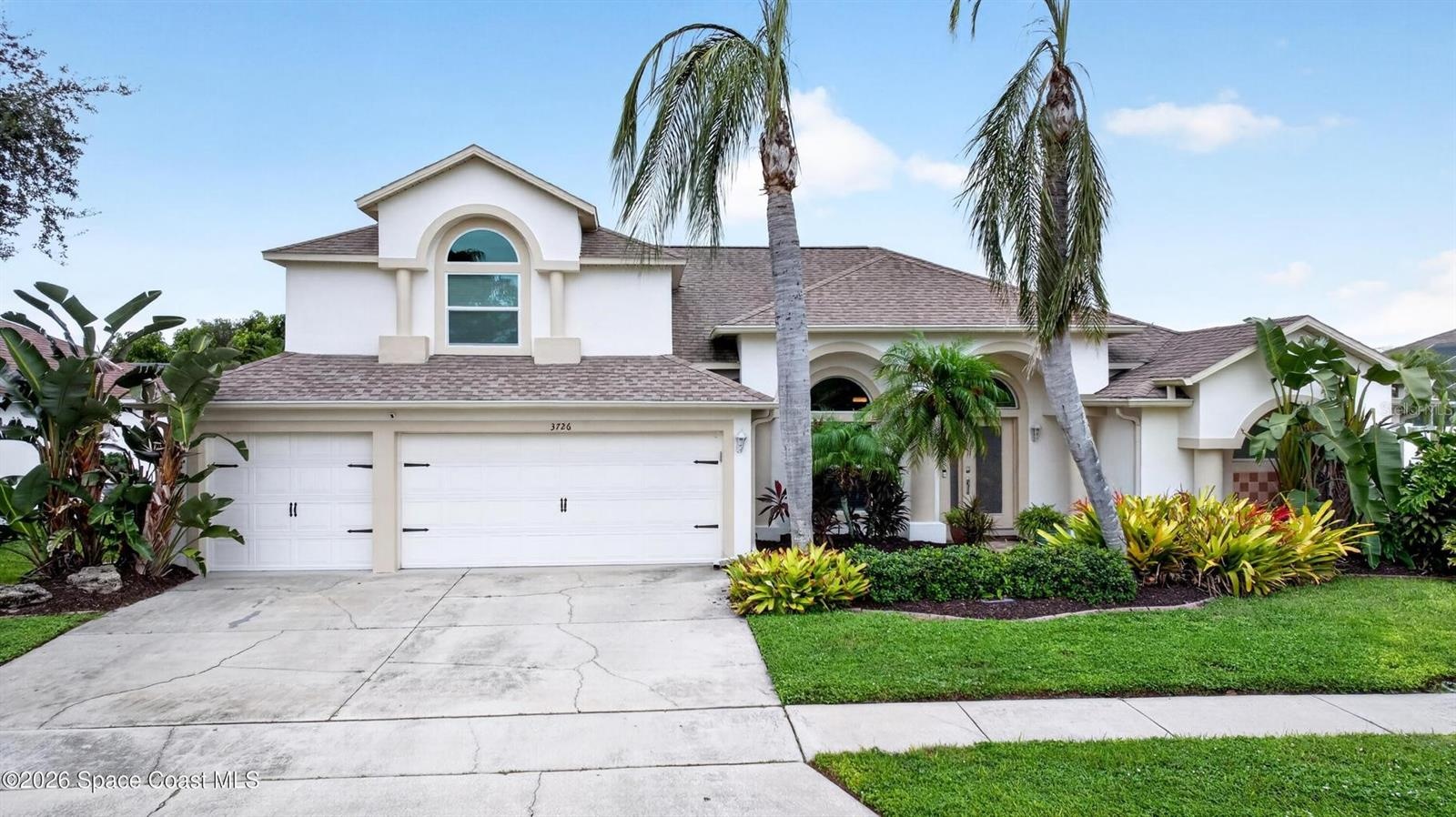 Classic curb appeal, 3 car garage
