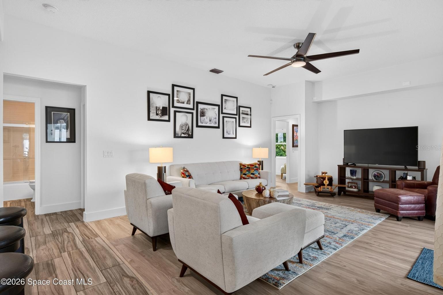 Spacious family room, wood look floors