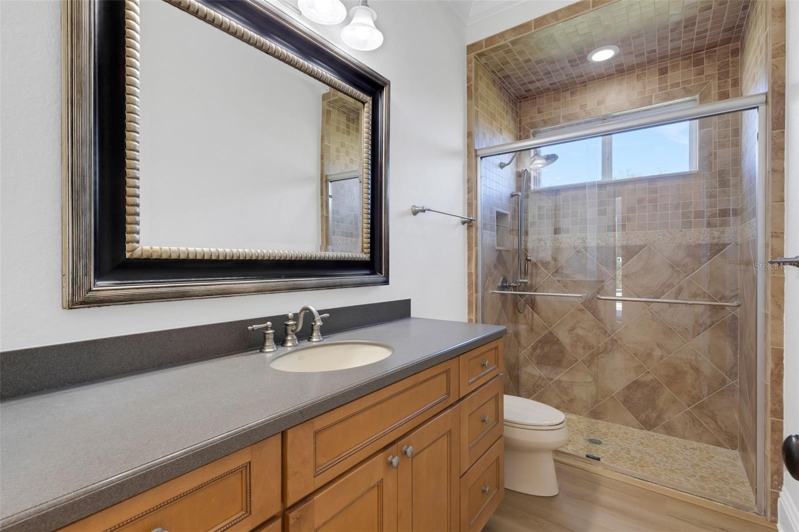 And bathroom #3 is directly adjacent and does double duty as your pool bath.