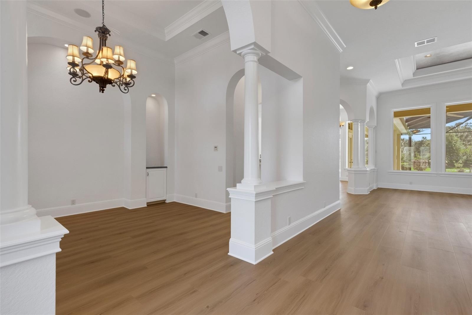 New luxury vinyl plank flooring throughout the first floor and freshly painted from ceiling to baseboards.