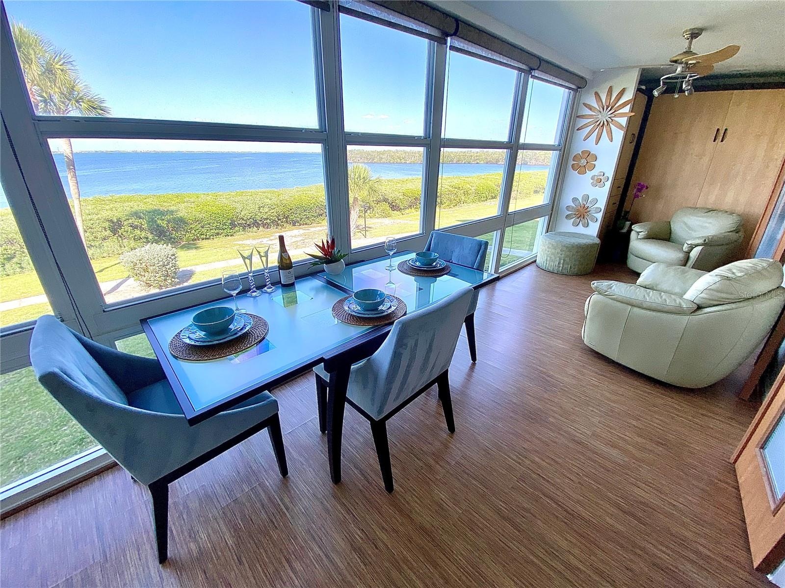 Sarasota Bay Dining in Florida Room. Bonus Queen Size Murphy Bed and Guest Closet!