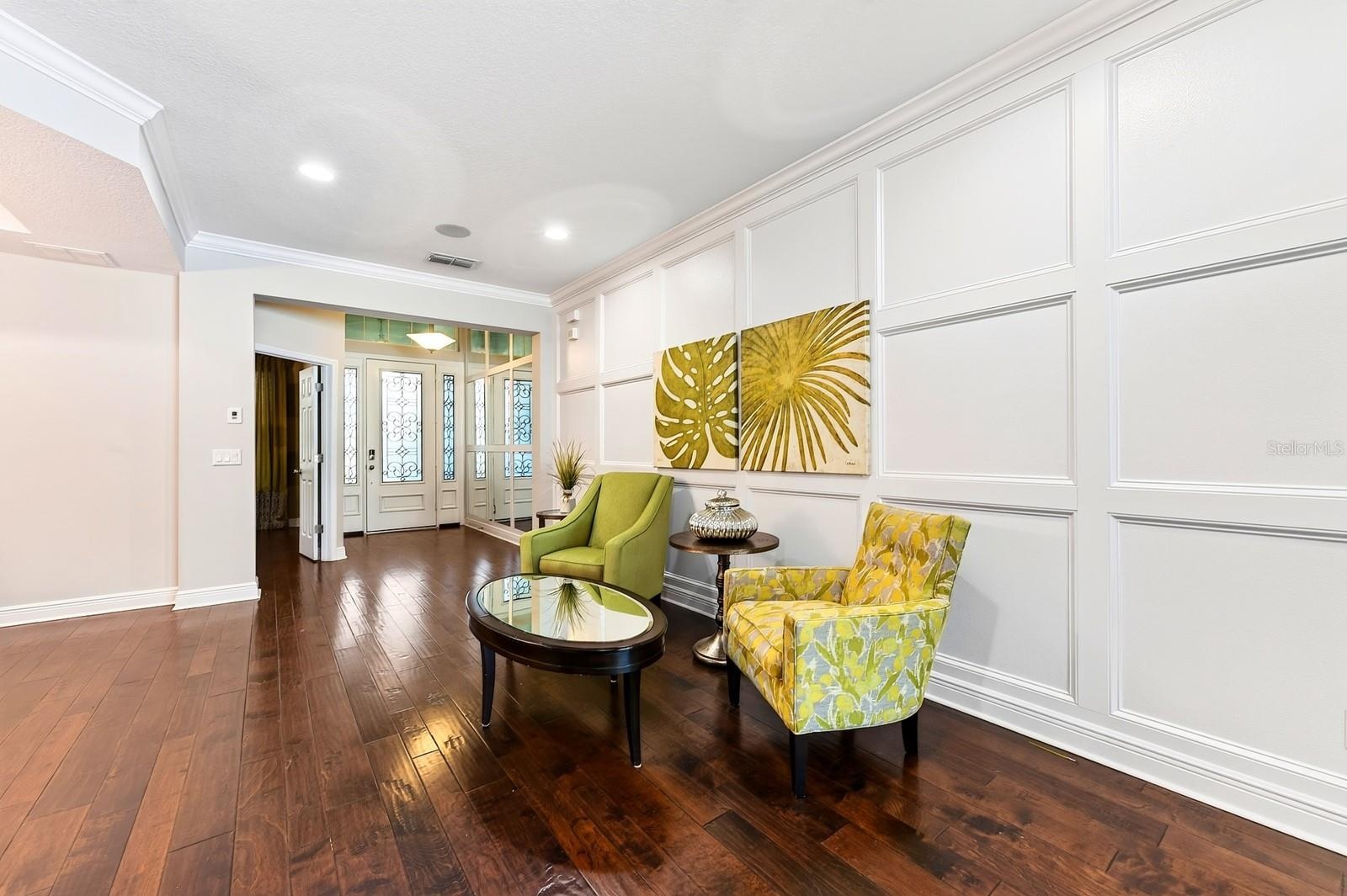 Foyer open to the formal living and dining spaces.