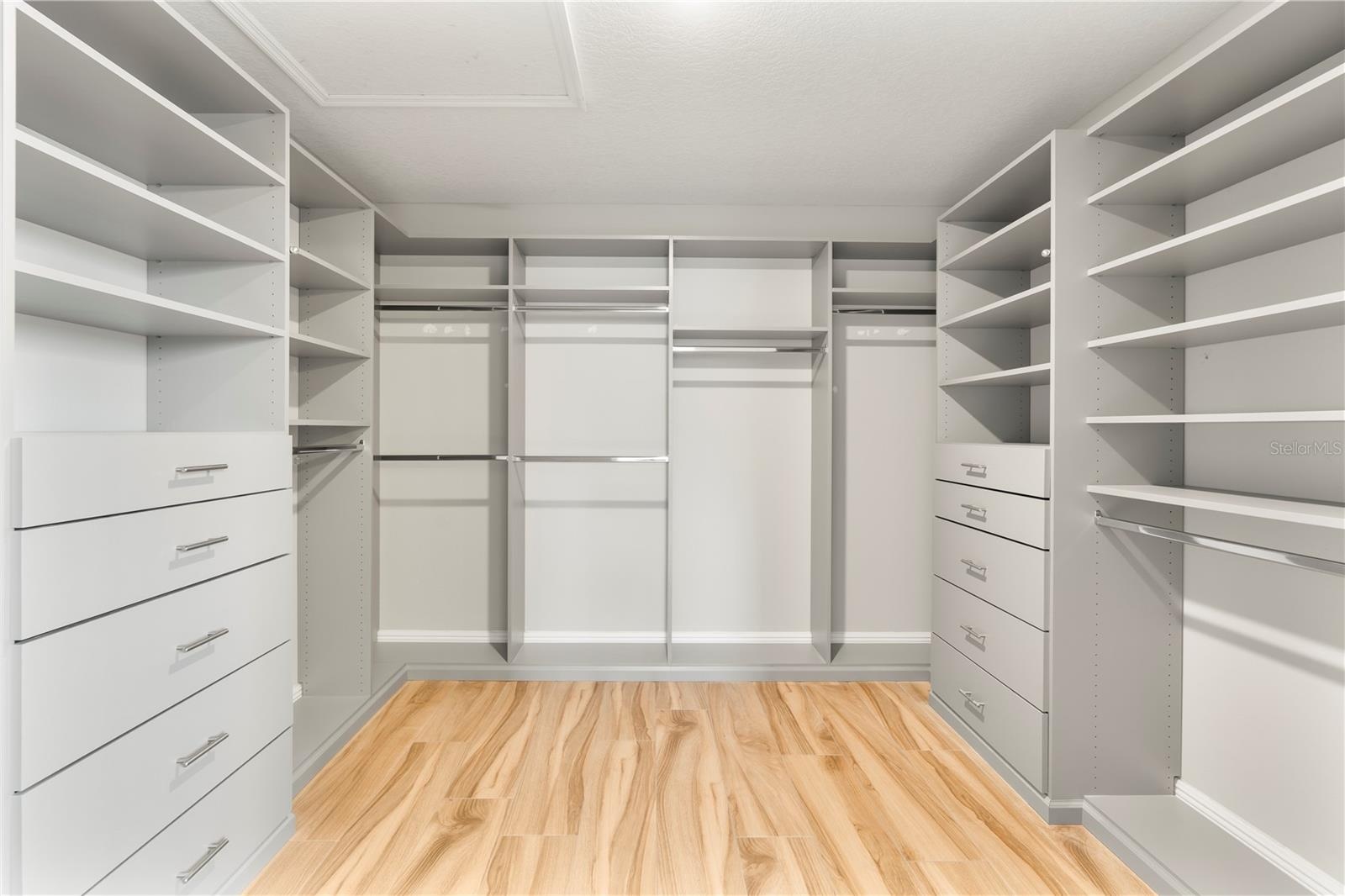 CUSTOM CALIFORNIA CLOSET (EN SUITE TO PRIMARY BEDROOM)