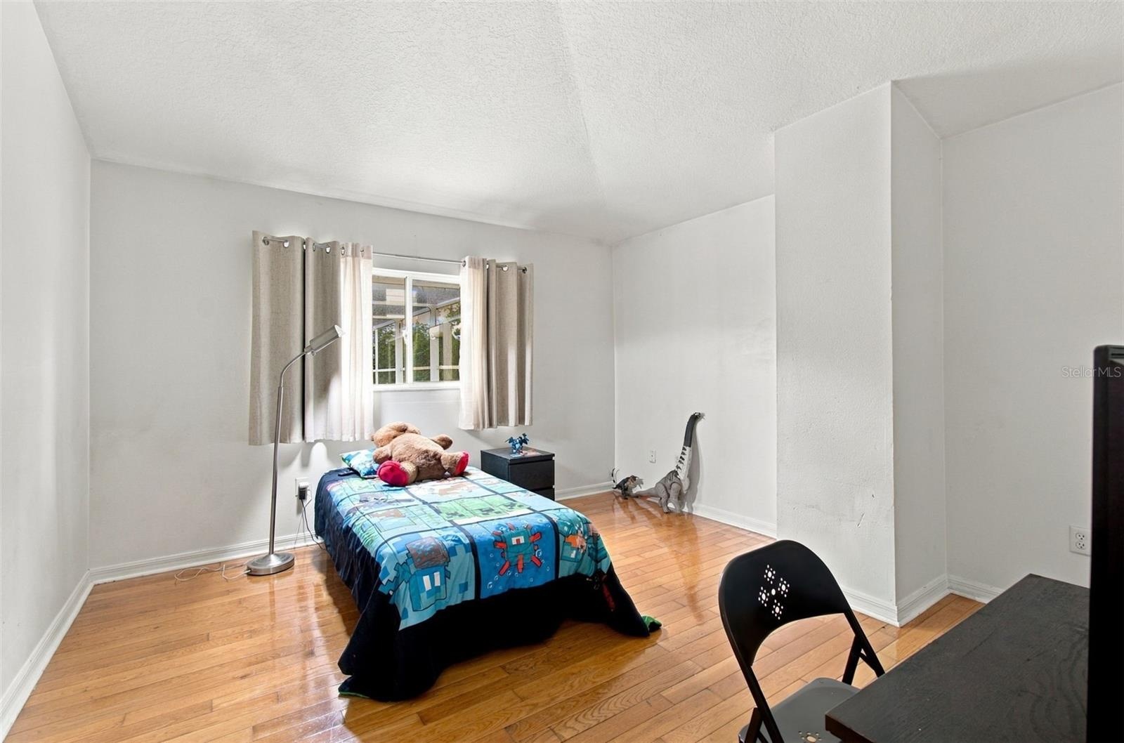 Warm Wood Floors in all Bedrooms