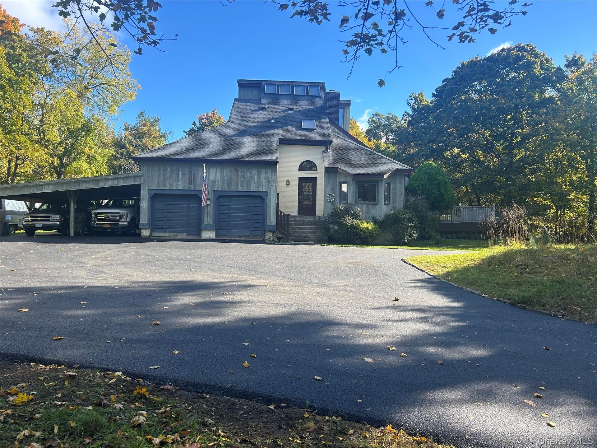newly paved asphalt driveway, beautifully finished