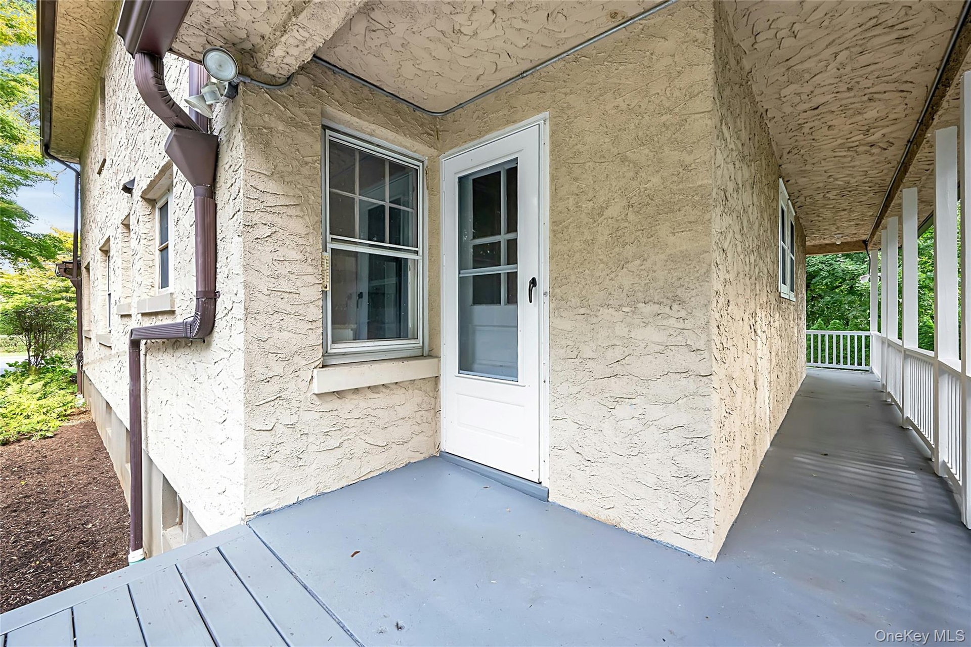 View of backdoor entranceway from porch