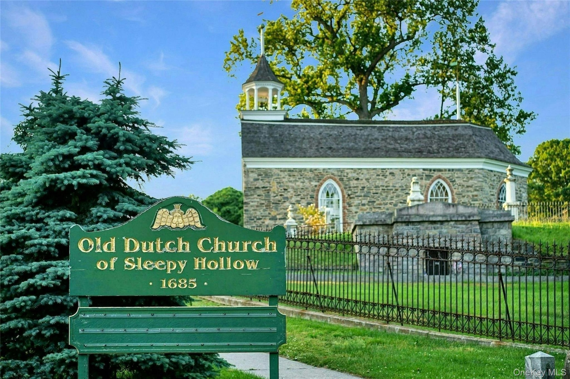 Adjacent to the cemetery, this 17th-century stone church is listed on the National Register of Historic Places