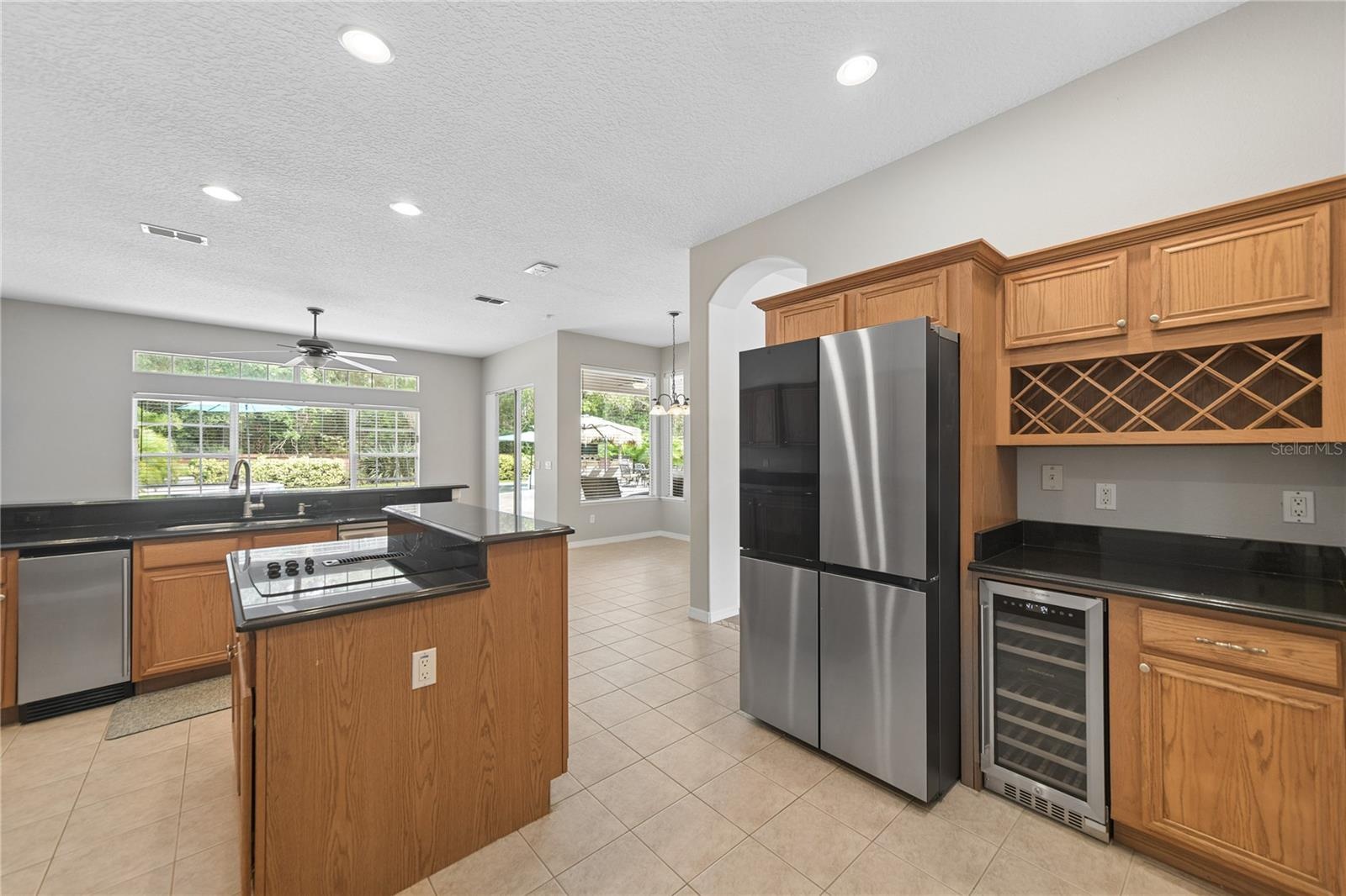 Here you can see the new ice maker next to the sink, along with the new Samsung 4 door refrigerator and wine fridge.