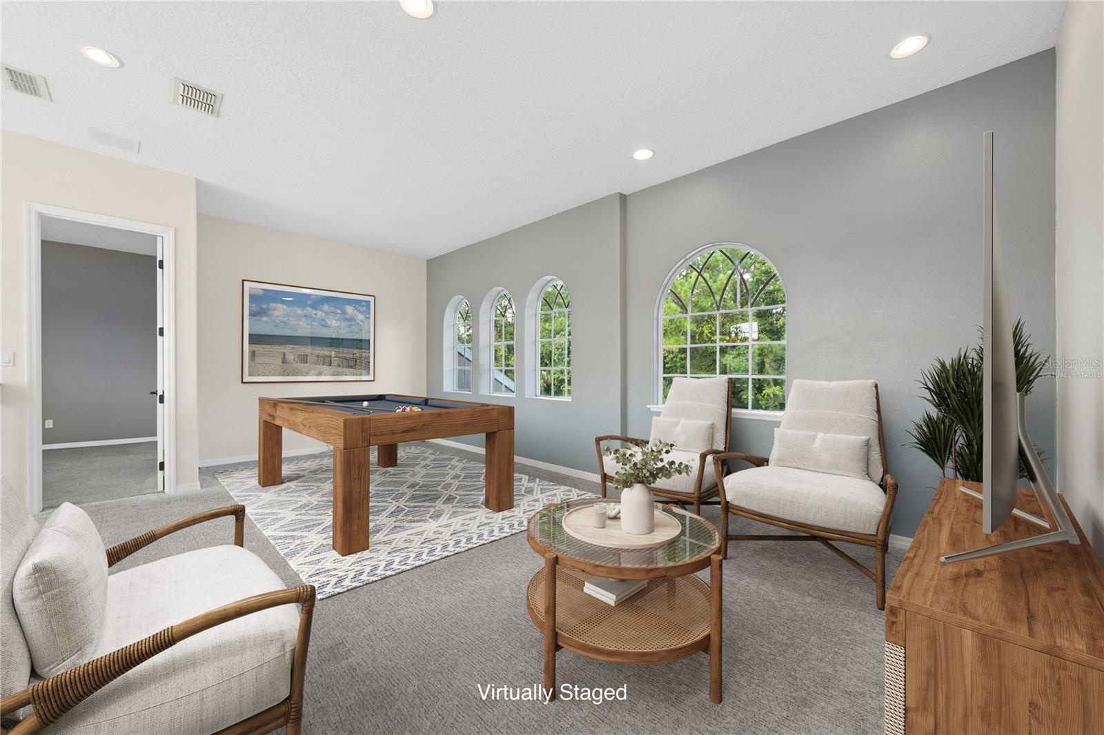 Now onto the 2nd floor, starting with this amazing game room or flex space at the top of the grand staircase for you to do with as you choose (photo v