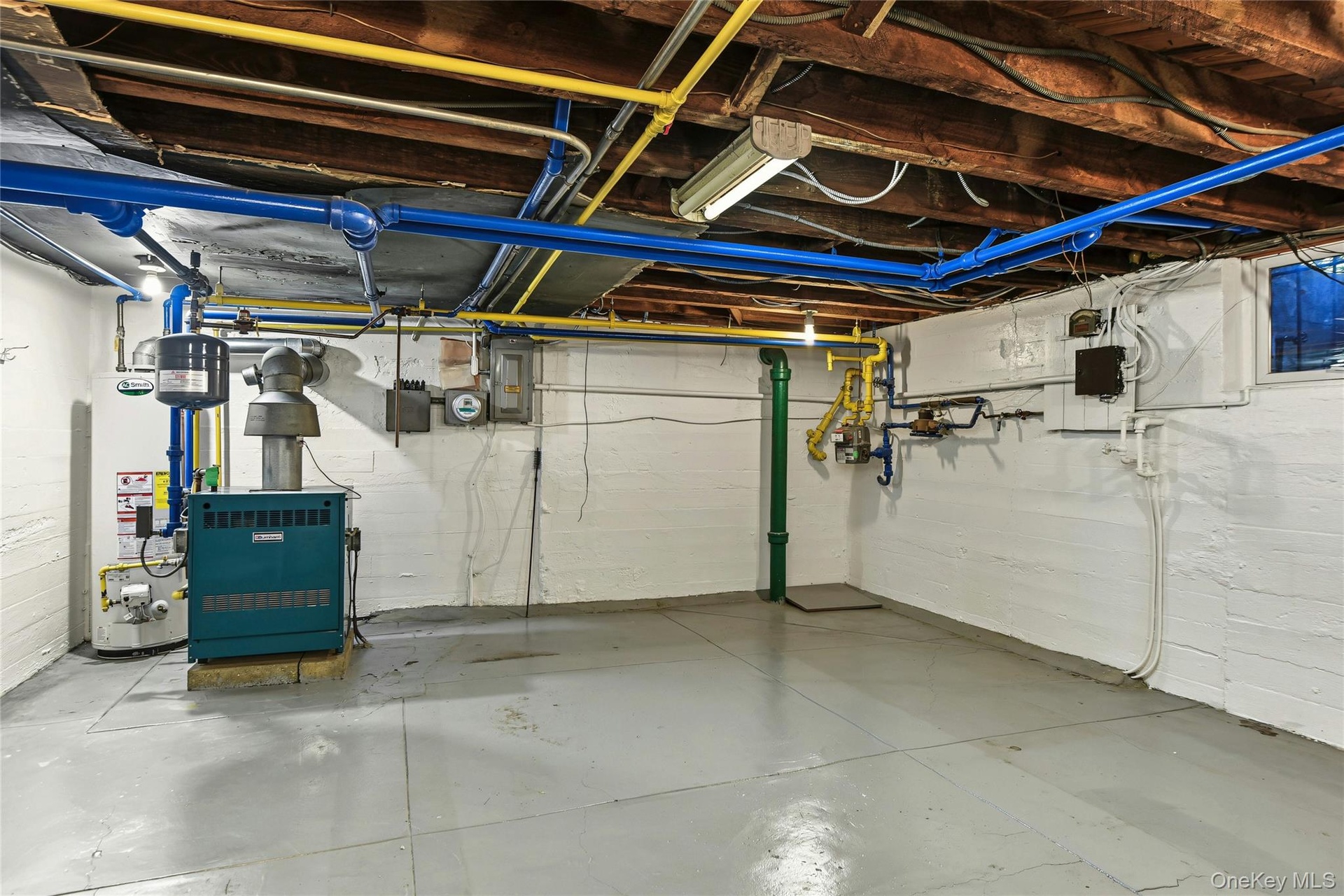 basement utility room with storage
