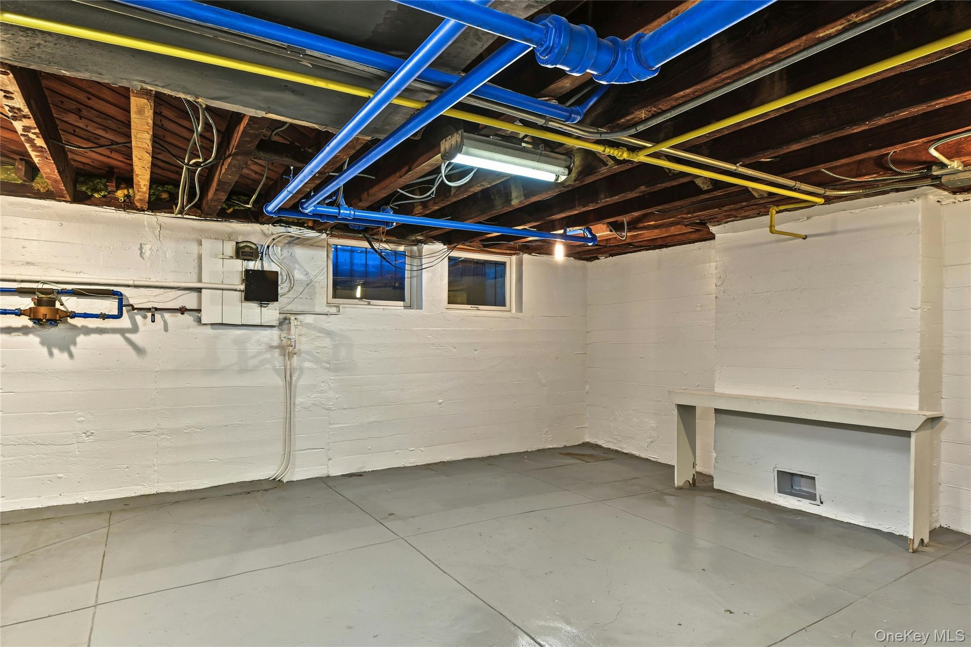 basement utility room with storage