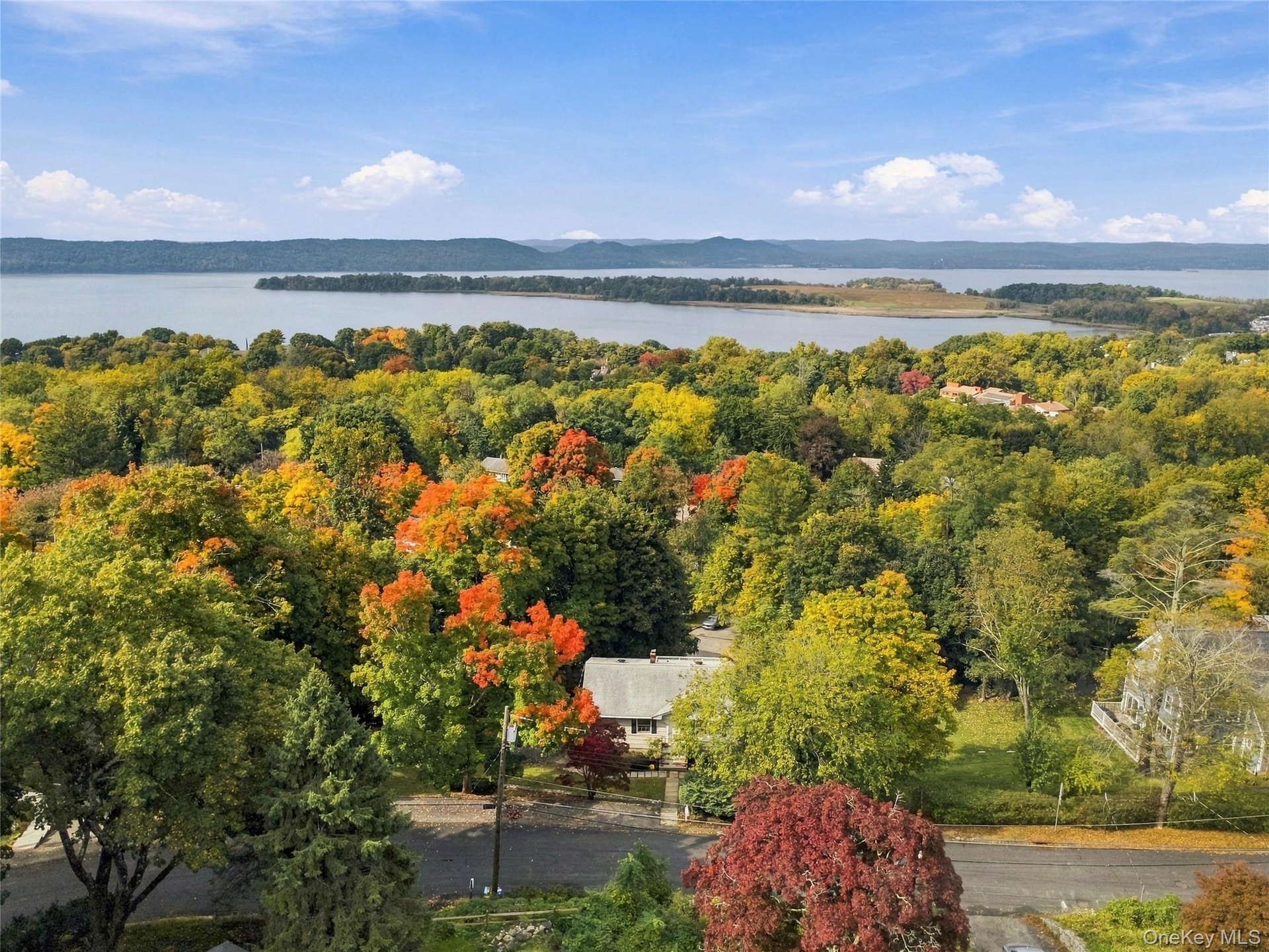 Front view of the home showcasing its charming exterior and beautiful Hudson River views.