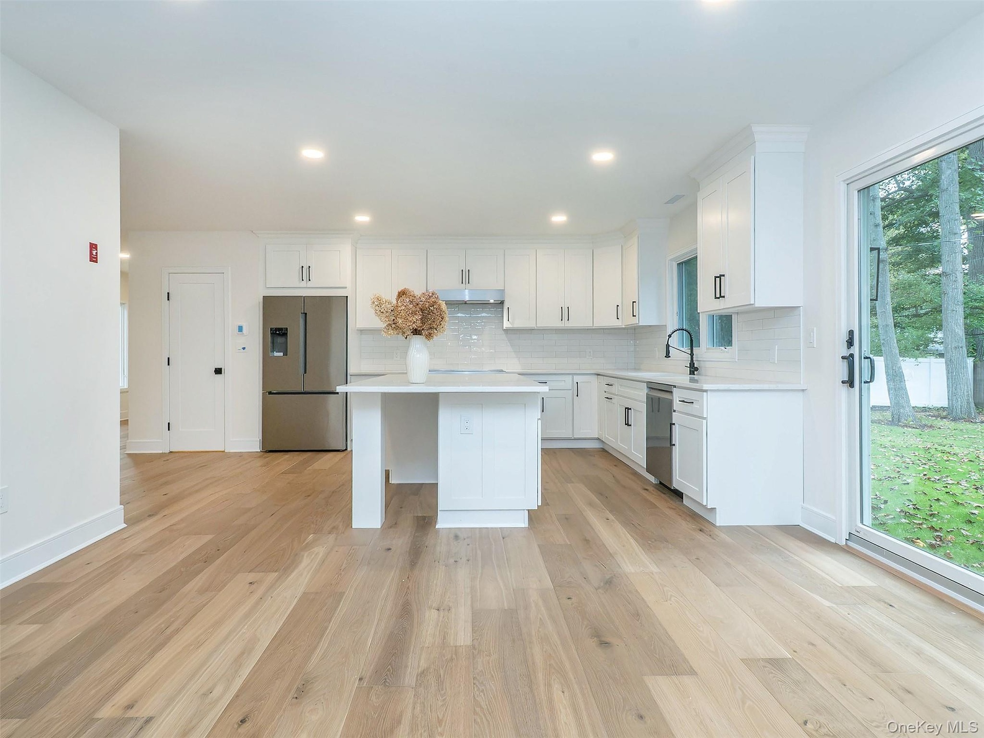 Next to the Fridge is a WALK-IN PANTRY
