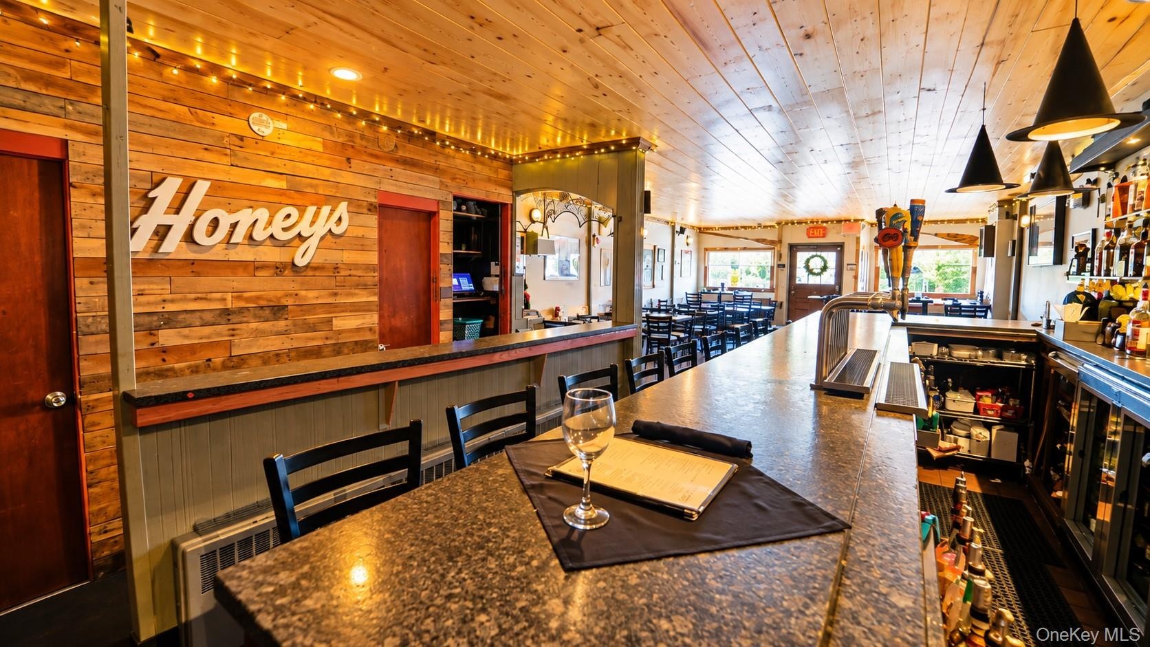 Some know it as Honey’s, others call it the Tavern, but everyone knows it as a local favorite for the best pizza, juicy burgers, flavorful wings, and 