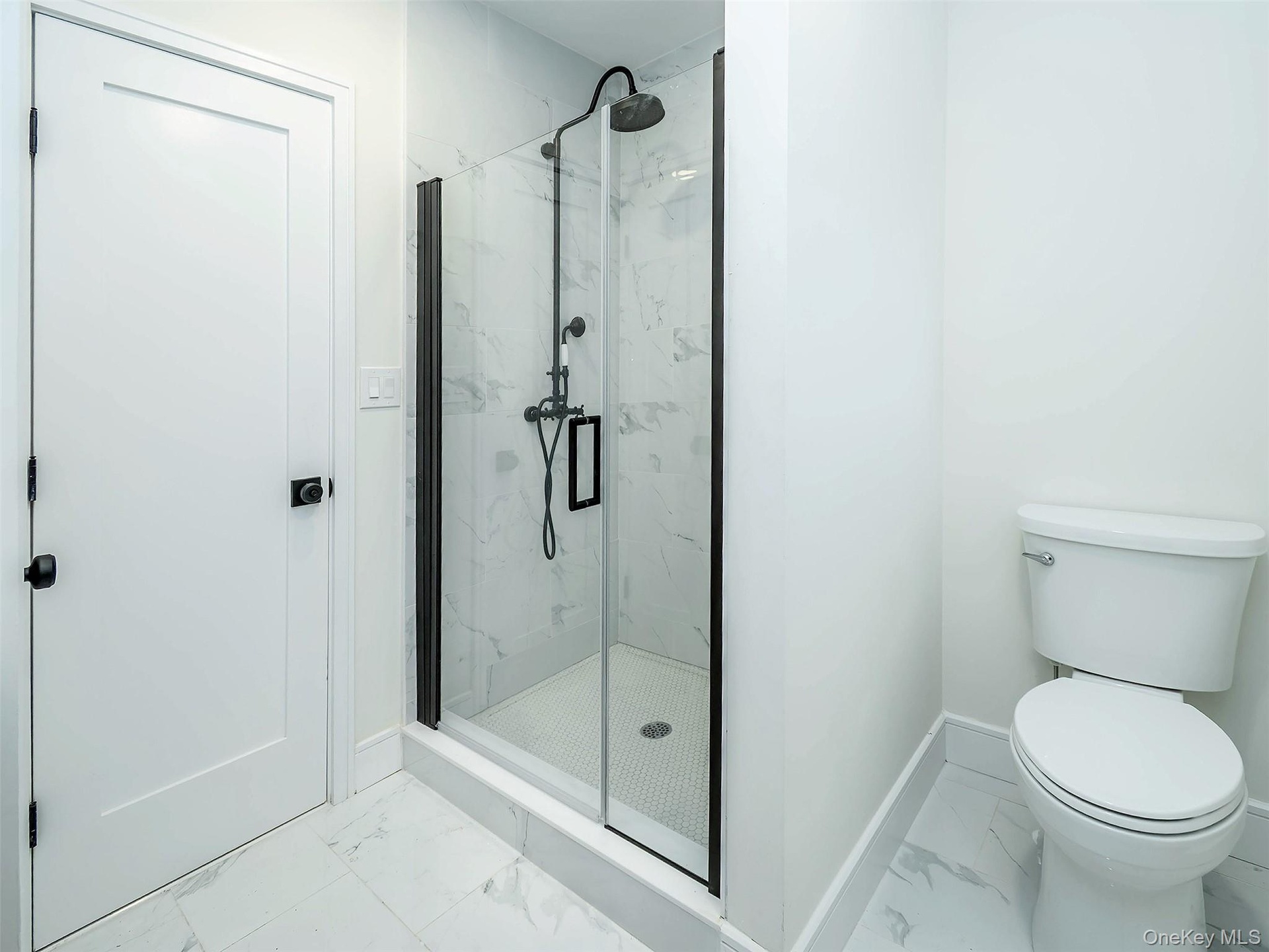 1st Floor: Primary bathroom with stall shower