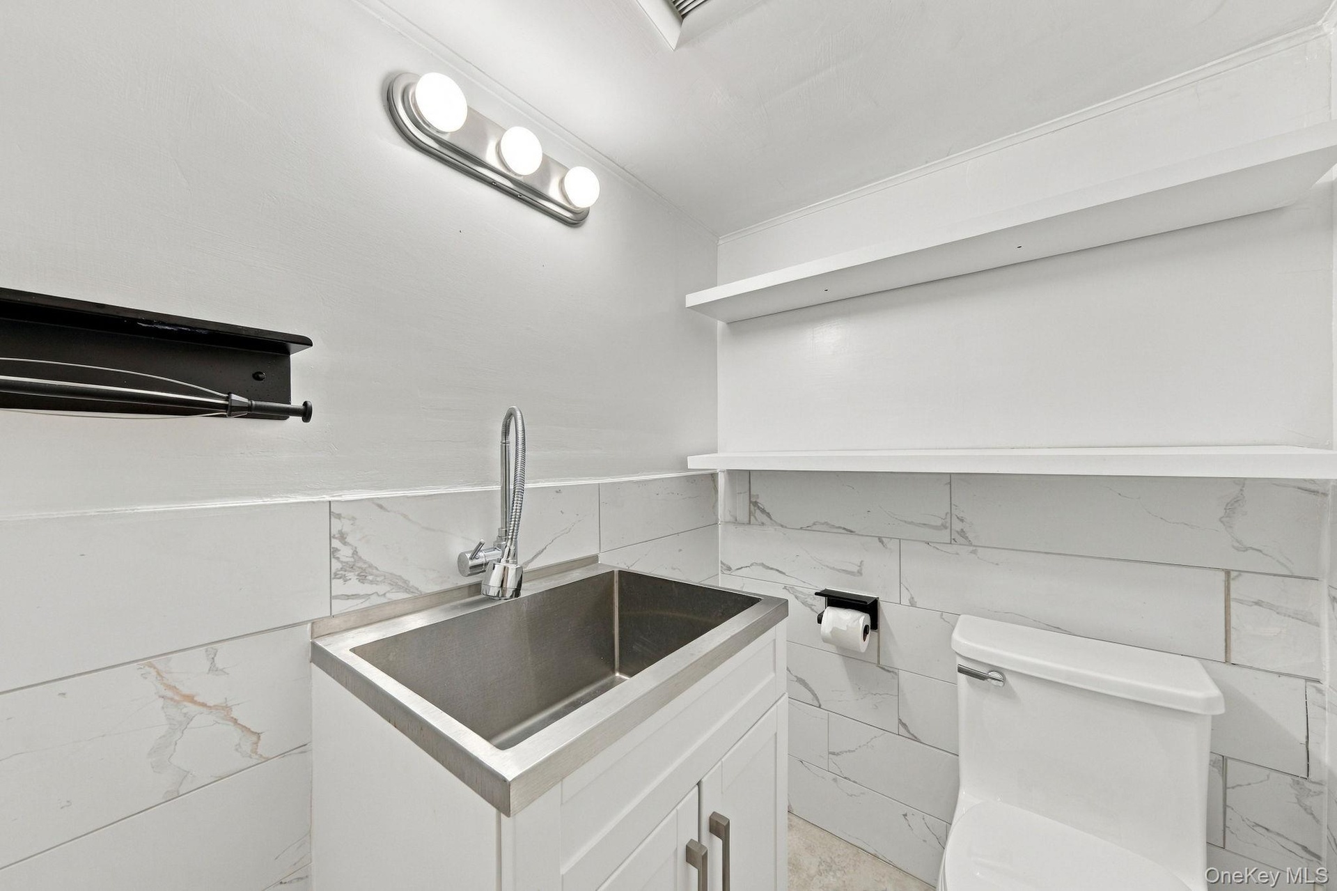 Located off the laundry room