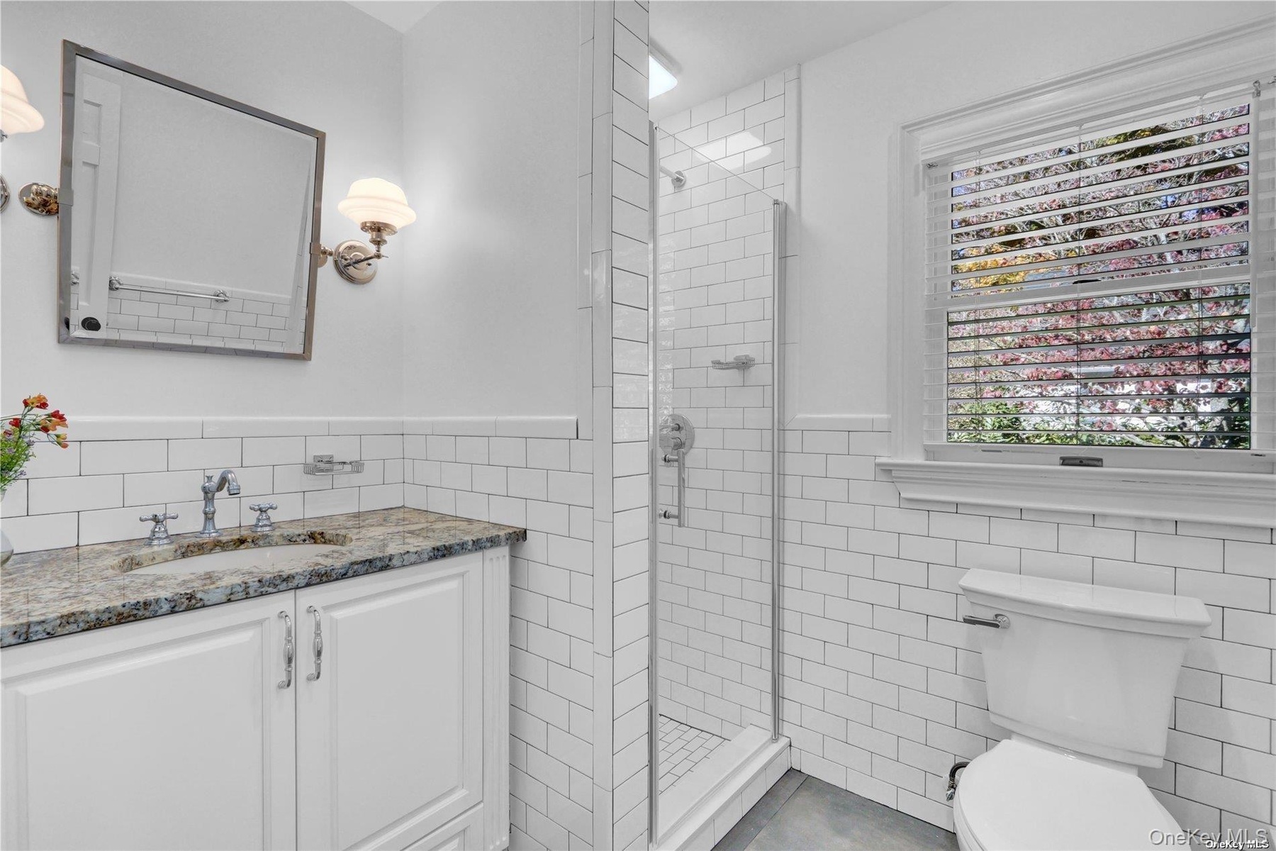 Brand new bath, white subway tiles, tile floor, spacious vanity with drawers