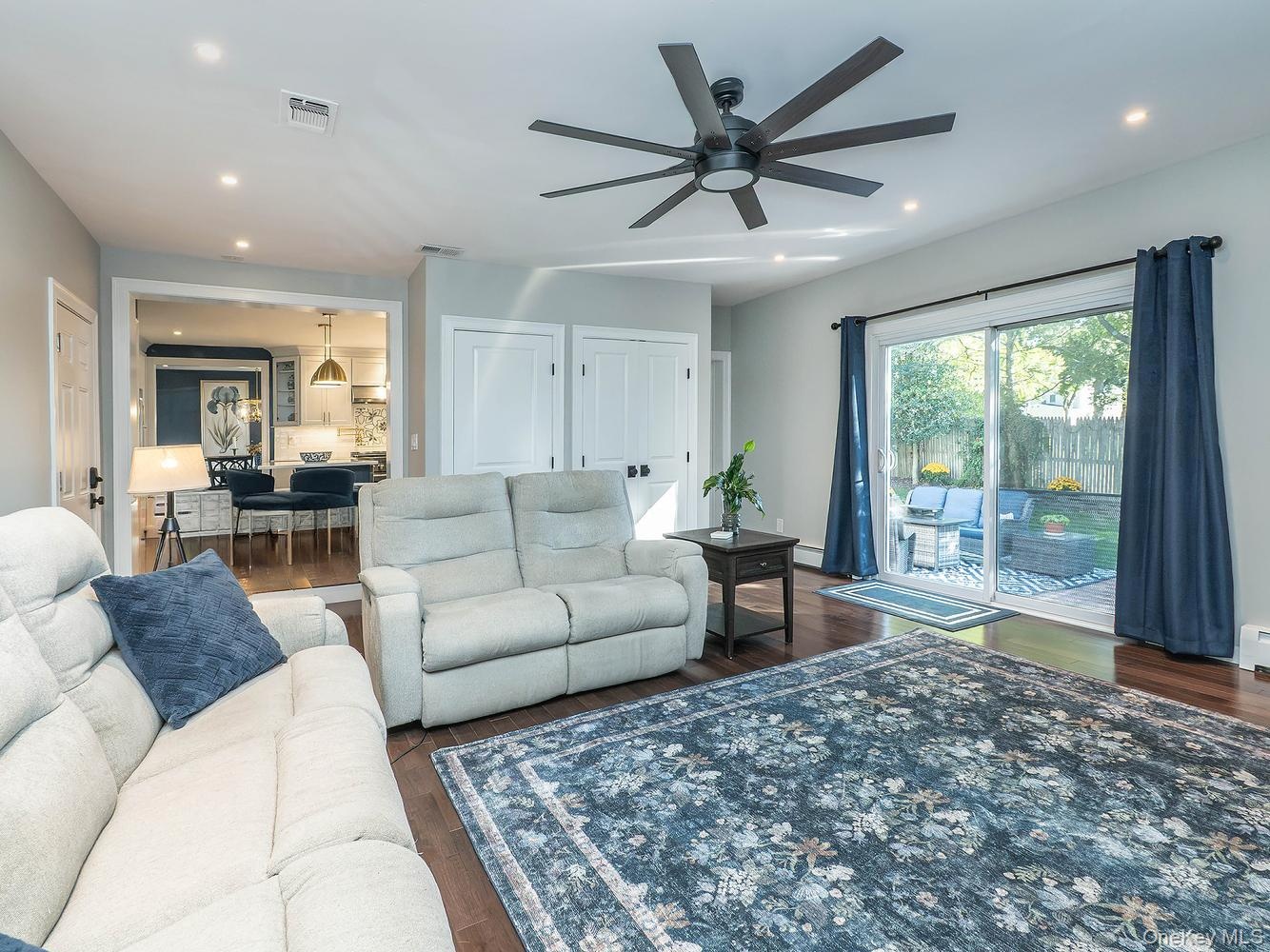 Family room/ Den with several closets and a half bath