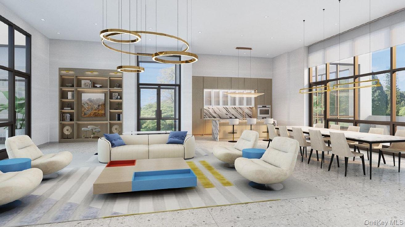 Community lobby with a high ceiling and recessed lighting