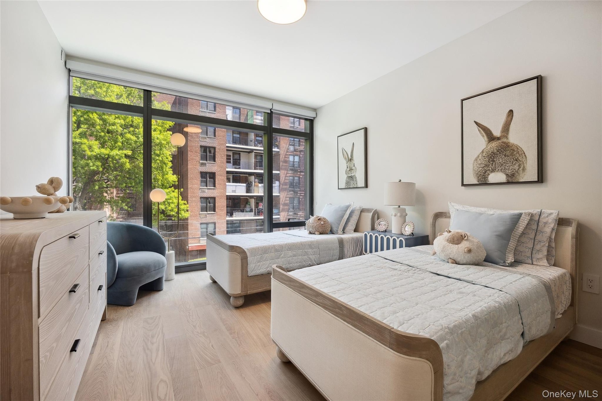 Bedroom with light wood finished floors
